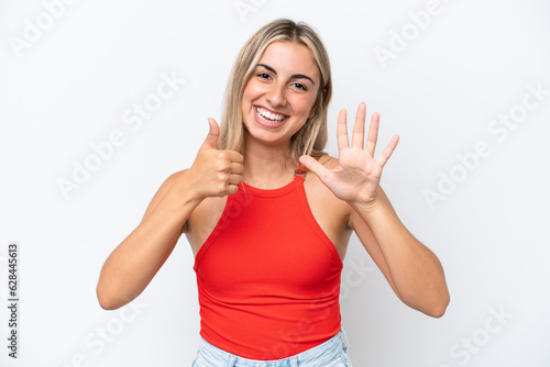 Young caucasian woman isolated on white background counting six with fingers