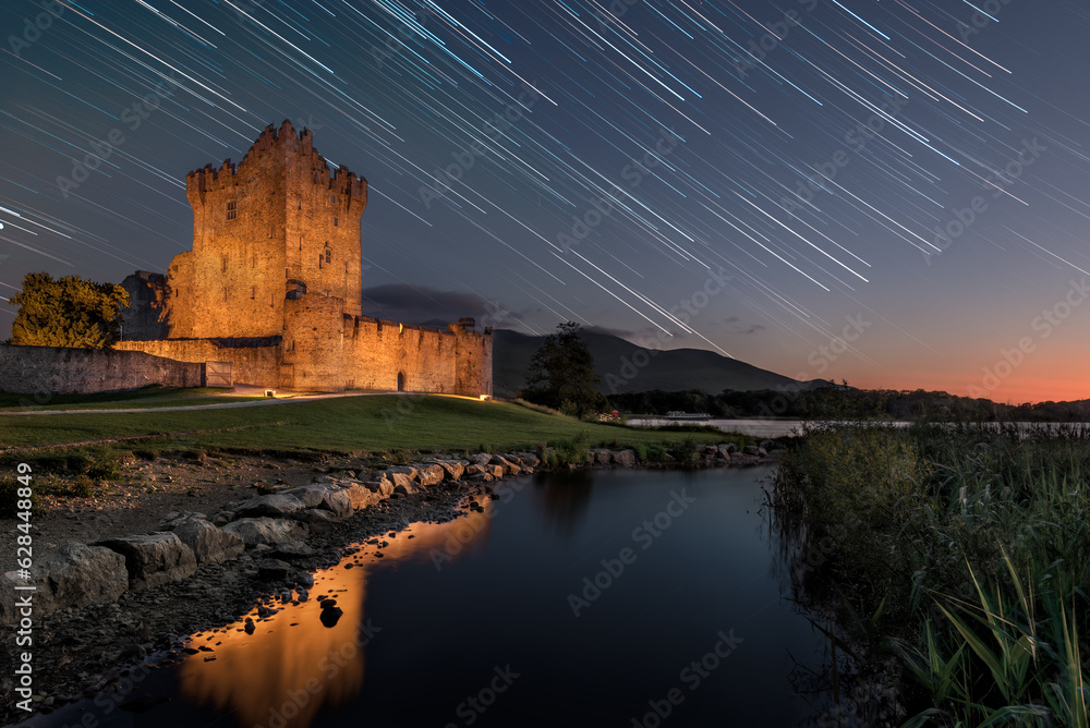 the old Ross castle at night with star trails