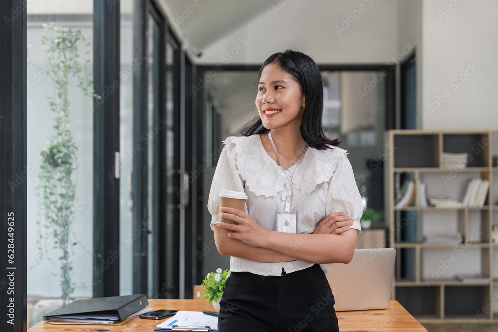 Successful business concept, Businesswoman drinking coffee during takes a break from work Successful business concept, Businesswoman drinking coffee during takes a break from work