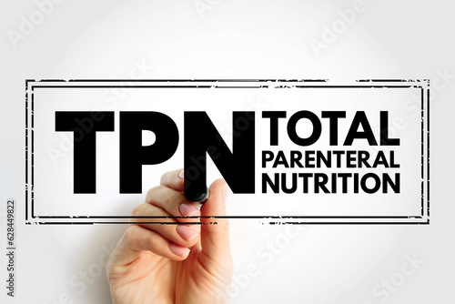 TPN Total Parenteral Nutrition - medical term for infusing a specialized form of food through a vein, acronym text stamp concept background photo