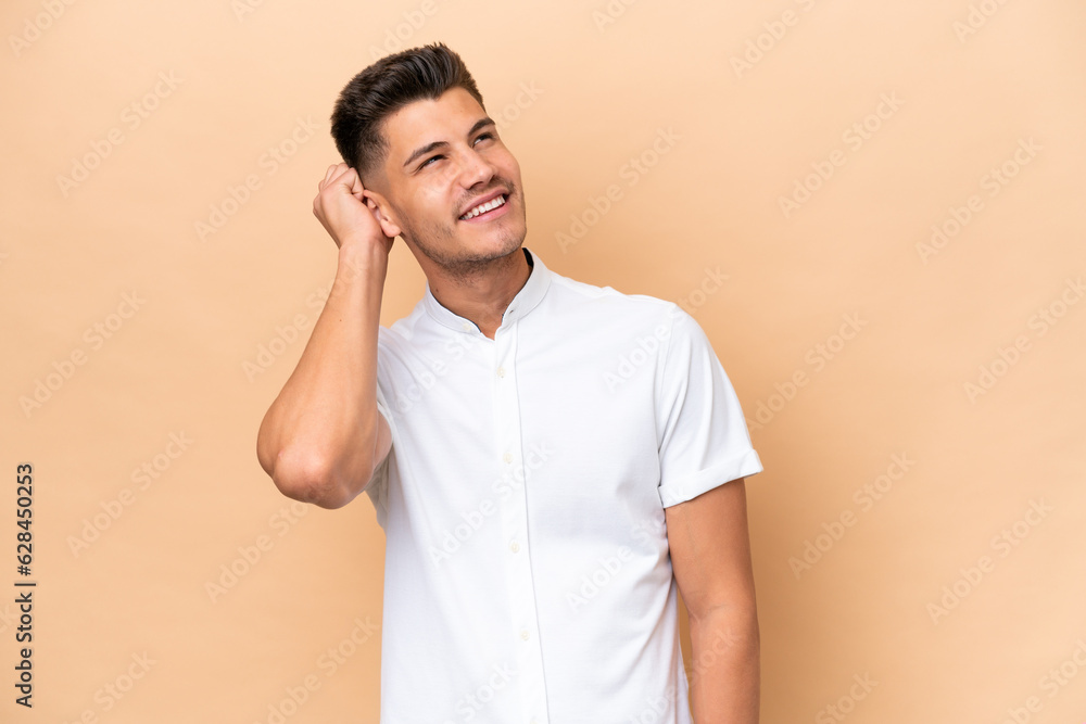 Young caucasian man isolated on beige background thinking an idea Young caucasian man isolated on beige background thinking an idea