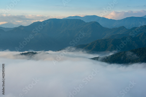 Fototapeta Naklejka Na Ścianę i Meble -  The dynamic sea of clouds is majestic and magnificent. Close up. Awe-Inspiring Views of the White Cloud Sea on the Mountaintop. Taiwan