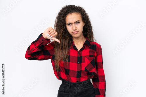 Young Arab woman isolated on white background showing thumb down with negative expression