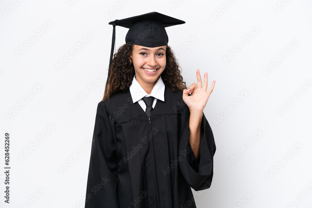 Young university graduate Arab woman isolated on white background showing ok sign with fingers Young university graduate Arab woman isolated on white background showing ok sign with fingers