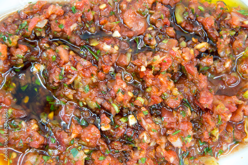 spicy turkish appetizer made with tomato, parsley and pepper
