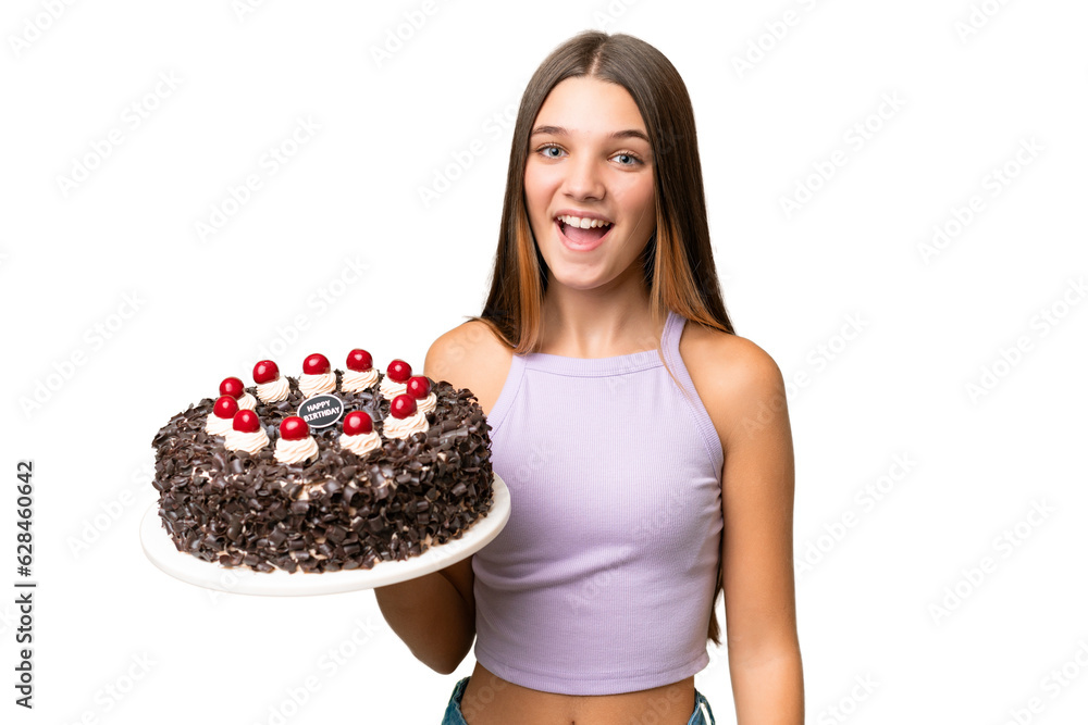 Teenager caucasian girl holding birthday cake over isolated background with surprise and shocked facial expression Teenager caucasian girl holding birthday cake over isolated background with surprise and shocked facial expression