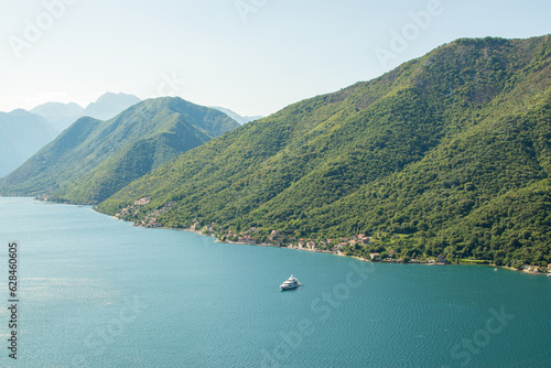 Mountains along the sea coast on a sunny day. Aerial Mediterranean bay seascape. Beauty of nature concept background.