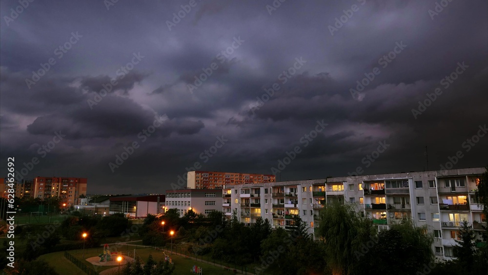 Fototapeta premium Time Lapse Sunset And Evening Residential Block