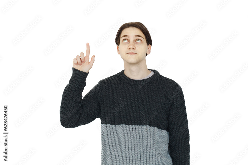 Clever young man in black sweater pointing up on white background Clever young man in black sweater pointing up on white background
