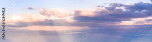 unique natural phenomenon of glow from below the sea to amazing evening colorful clouds, bright golden unusual rays