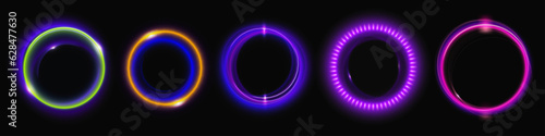 Set of round neon light flares isolated on black background. Vector realistic illustration of circular swirls glowing in darkness, halo effect, energy vortex, LED illumination, disco illumination