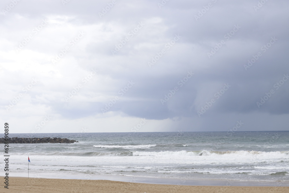 Cloudy day by the shore of San Sebastian, Spain Cloudy day by the shore of San Sebastian, Spain