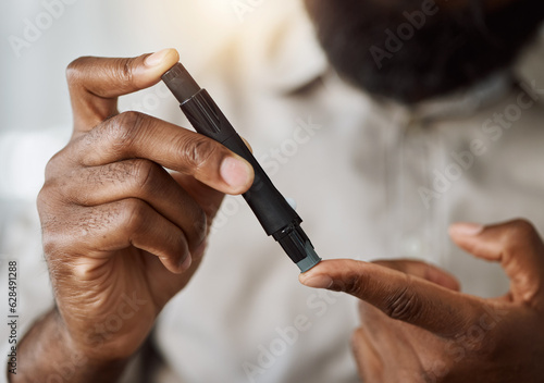 Person, hands and test blood sugar for diabetes, health analysis or medical glucometer results. Closeup of patient poke finger with needle to check insulin, measure glucose risk and diabetic medicine