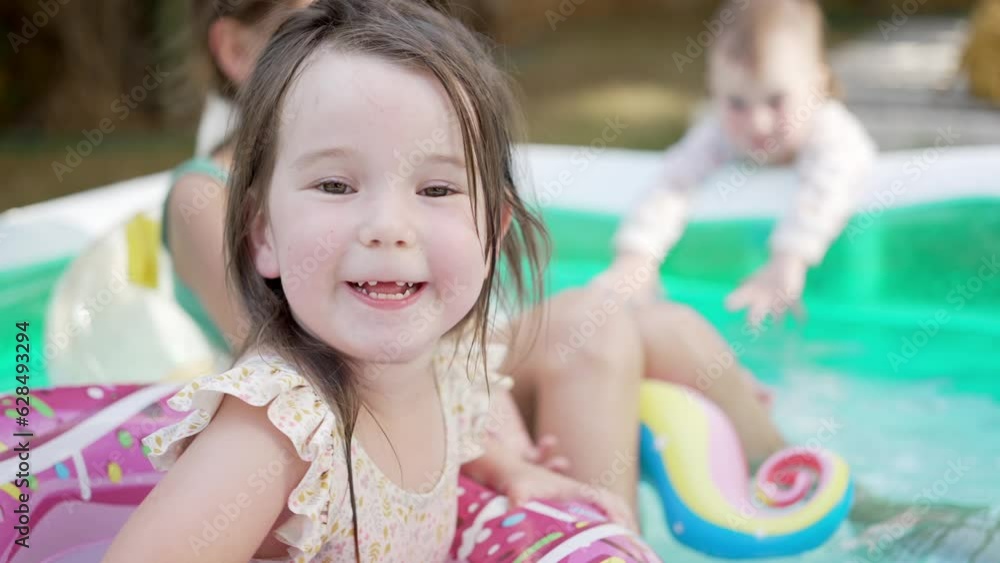Portrait of Little Girl Play and Have Fun and Splash with Water Portrait of Little Girl Play and Have Fun and Splash with Water