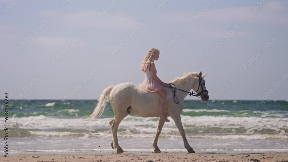 Blonde Girl On A Unicorn At A Beach Blonde Girl On A Unicorn At A Beach