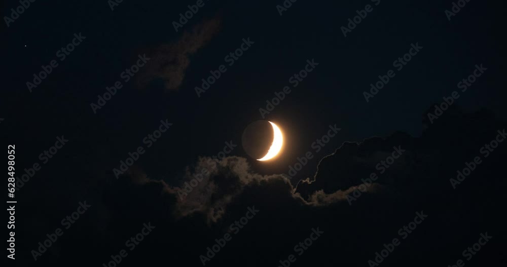 Time-lapse. Beautiful moon in the clouds at night. Time-lapse. Beautiful moon in the clouds at night.