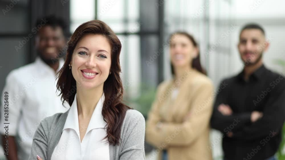 Confident businesswoman posing while looking at camera Confident businesswoman posing while looking at camera