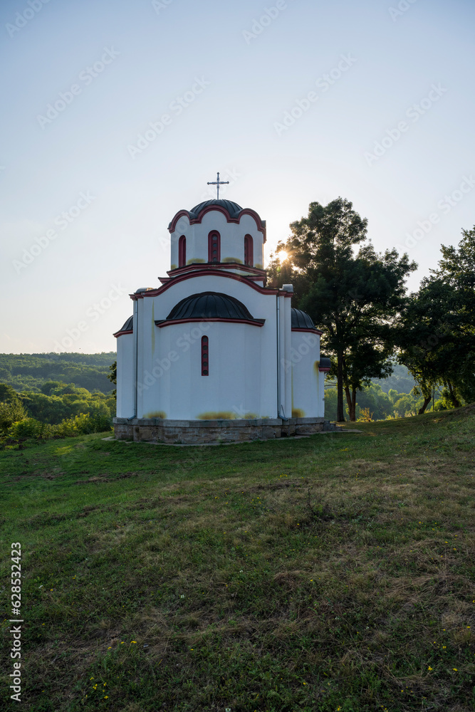 Orthodox Christian church. Vintage church in the wild. Church of St. John the Baptist in Kacapor settlement, Blace municipality, Serbia.
