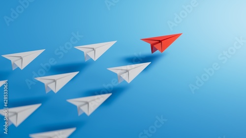 Leadership concept with red paper plane leading among white on blue background.3D rendering on blue background. 