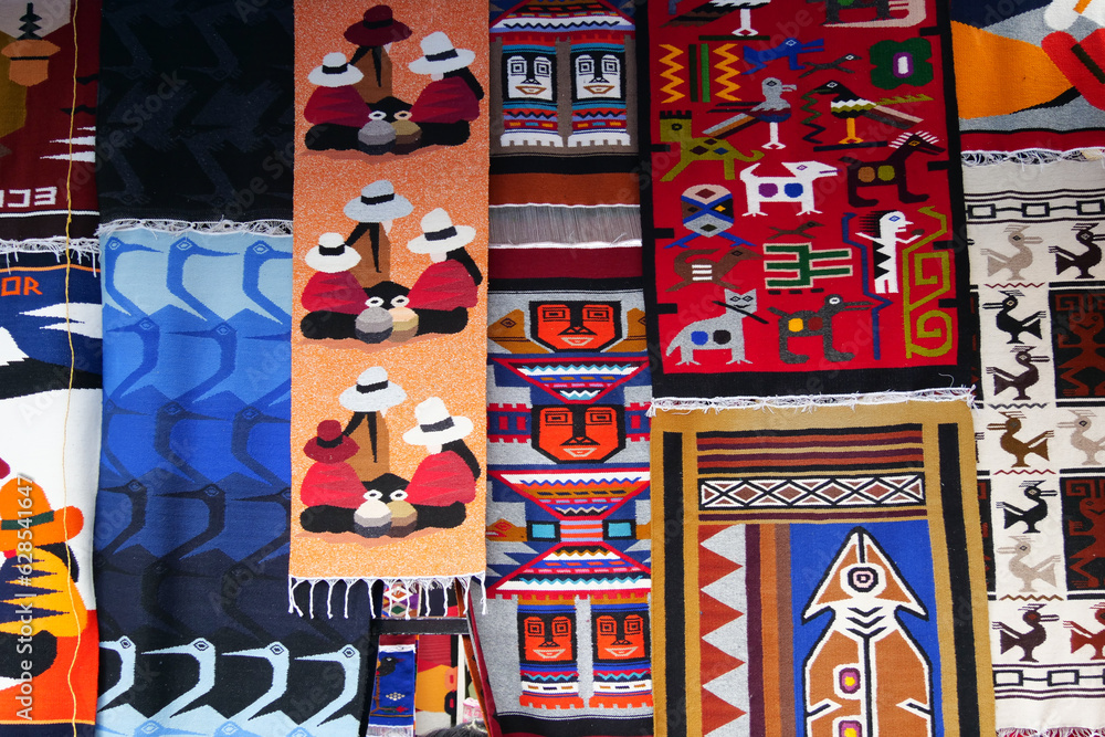 Colorful  traditional woven carpets for sale at Otavalo market in Ecuador