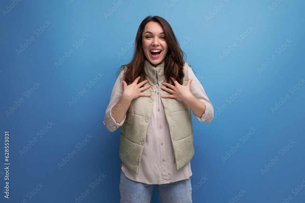 positive young brunette lady friendly posing and smiling positive young brunette lady friendly posing and smiling