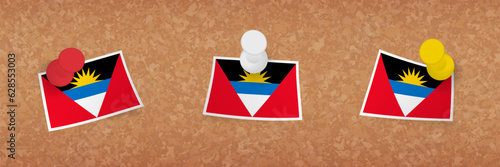 Antigua and Barbuda flag pinned in cork board, three versions of Antigua and Barbuda flag.