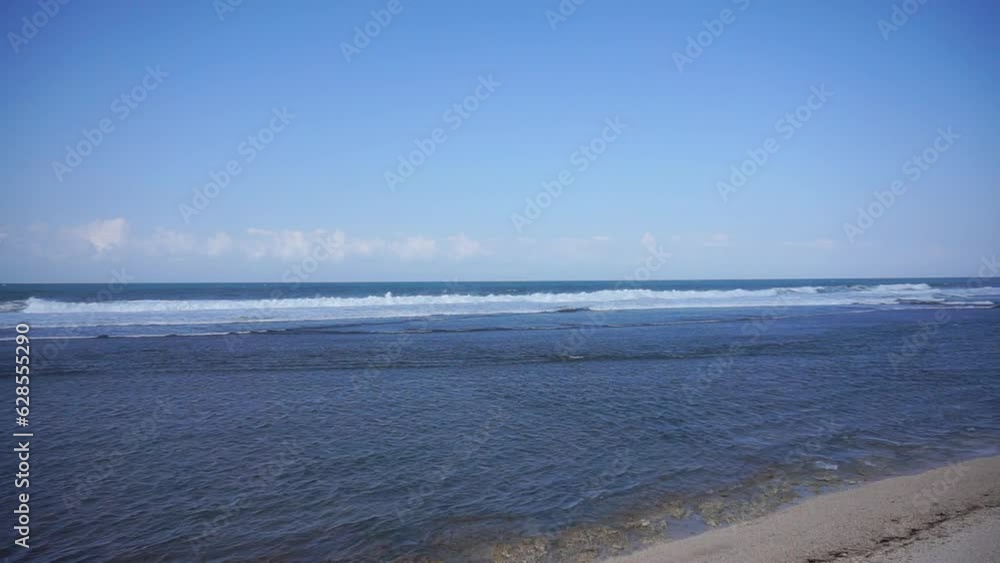 beautiful views of the sea with small waves, beautiful natural panoramas during the day at Sayang Heulang beach, South Garut beautiful views of the sea with small waves, beautiful natural panoramas during the day at Sayang Heulang beach, South Garut