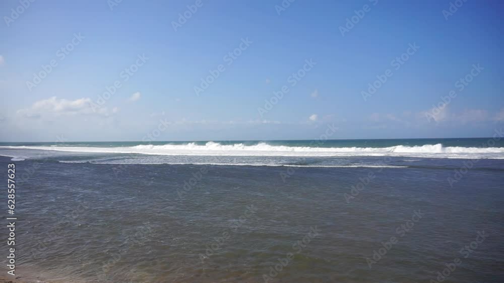 beautiful views of the sea with small waves, beautiful natural panoramas during the day at Sayang Heulang beach, South Garut beautiful views of the sea with small waves, beautiful natural panoramas during the day at Sayang Heulang beach, South Garut
