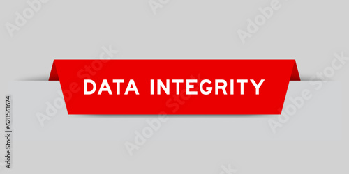 Red color inserted label with word data integrity on gray background