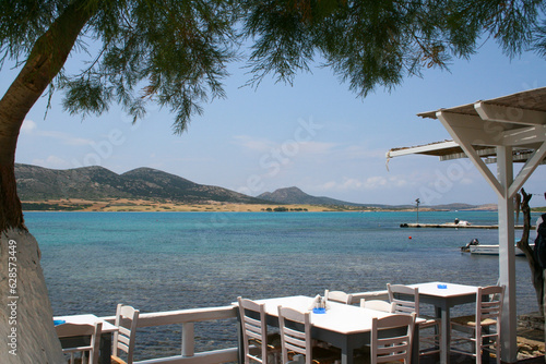 View from a small restaurant at Antiparos to Despotiko Island photo