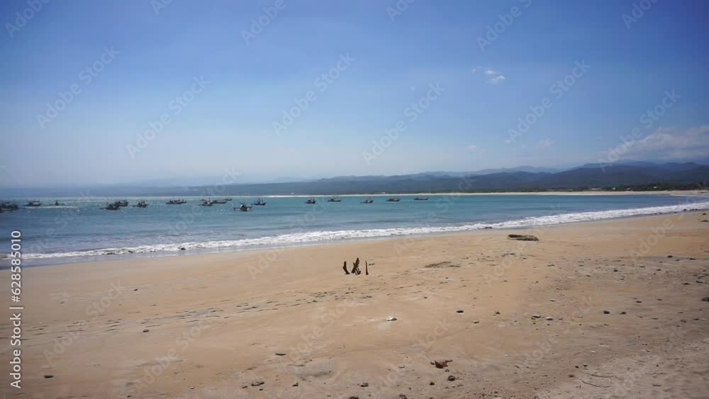 beautiful views of the sea with small waves, beautiful natural panoramas during the day at Sayang Heulang beach, South Garut beautiful views of the sea with small waves, beautiful natural panoramas during the day at Sayang Heulang beach, South Garut