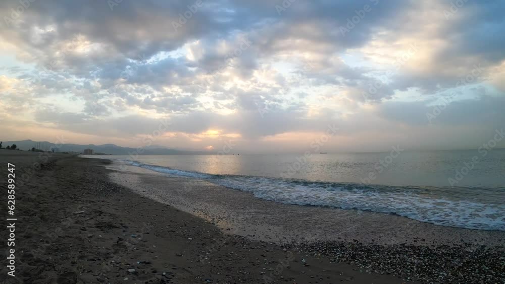 Beautiful sunrise on Malaga coastline, Costa del Sol Beautiful sunrise on Malaga coastline, Costa del Sol