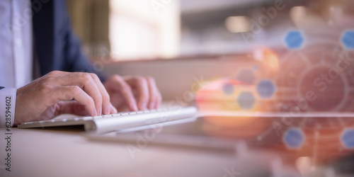 Businessman hands typing on laptop computer keyboard, surfing internet working in business concept.SEO, Search Engine Optimization, analysis financial data report, investment strategy and planning