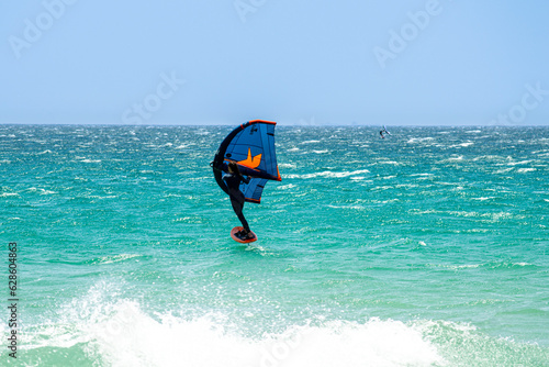 Kitesurfing on Valdevaqueros beach, Gibraltar Strait in Tarifa, Spain on June 17, 2023 photo