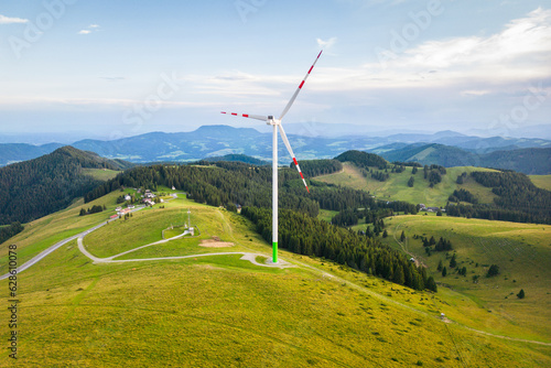 Wind generators on a mountain pasture at the Sommeralm in Styria, Austria