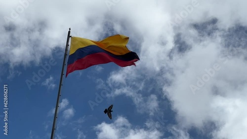 facade of the Senate of the Republic of Colombia with the flag waving in the center of Bogotá