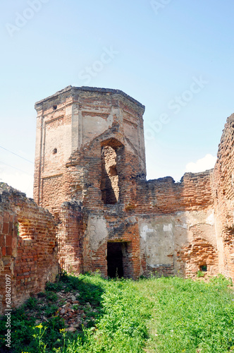 Ruins of the corner tower and walls of the Carthusian monastery of 1648-1666 in the city of Bereza, Belarus. photo