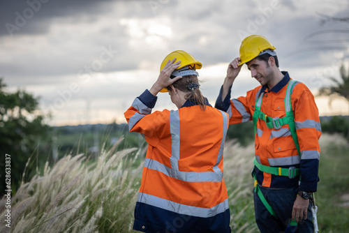 Bild auf Leinwand Engineer electricity technician  team rest stop working strom cloudy raining sky