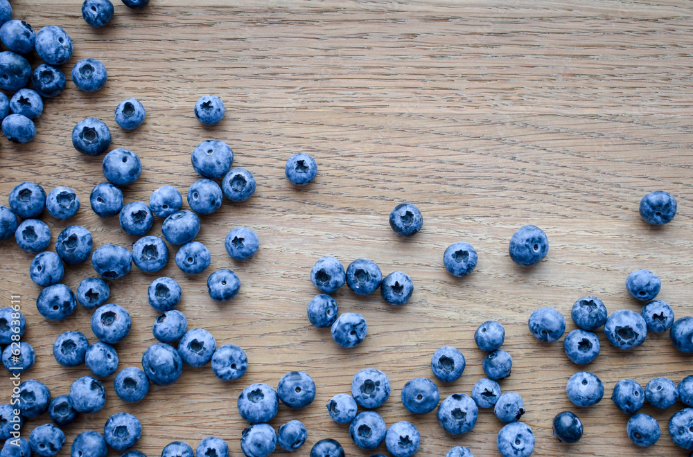 Beautiful blueberry on a wooden background. Quality image for your project Beautiful blueberry on a wooden background. Quality image for your project