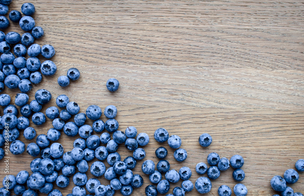Beautiful blueberry on a wooden background. Quality image for your project Beautiful blueberry on a wooden background. Quality image for your project