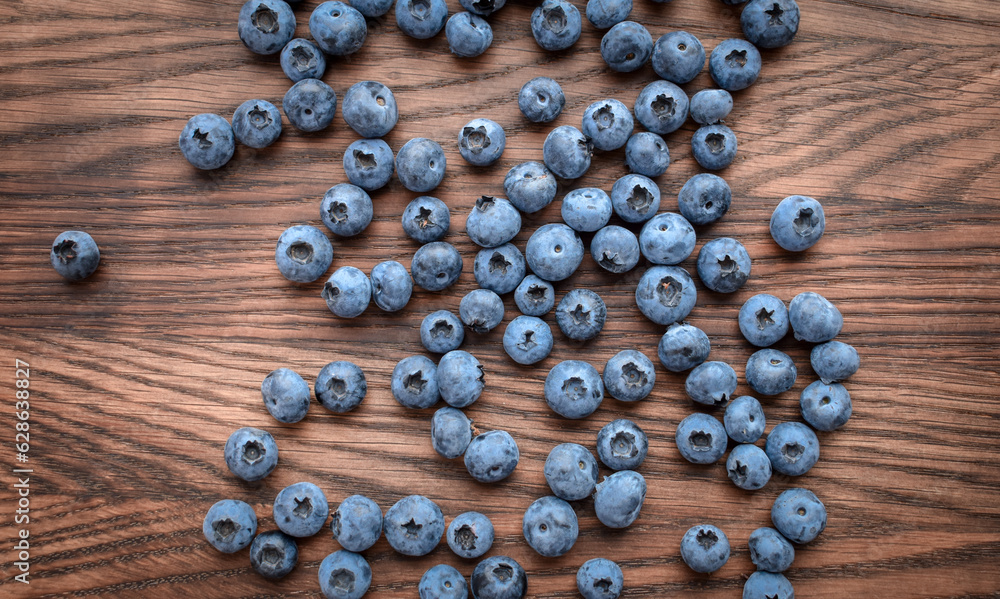 Beautiful blueberry on a wooden background. Quality image for your project Beautiful blueberry on a wooden background. Quality image for your project