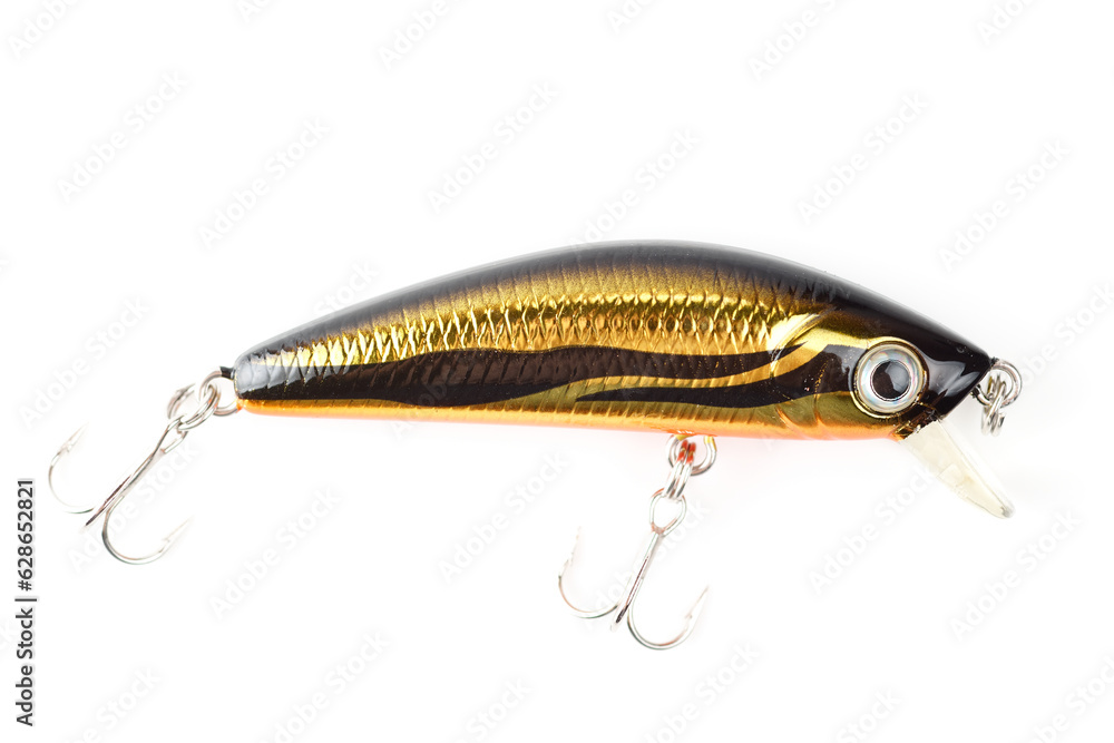 Yellow and black minnow plastic fishing lure isolated on white Yellow and black minnow plastic fishing lure isolated on white