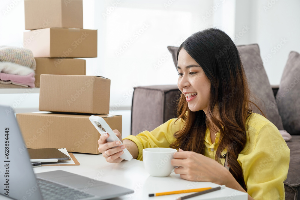Young businesswoman's dynamic workstation with coffee fuel. Young businesswoman's dynamic workstation with coffee fuel.