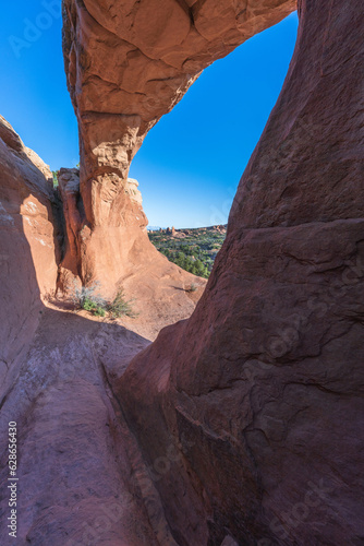 hiking the broken arch trail to tapestry arch in arches national park, utah, usa
