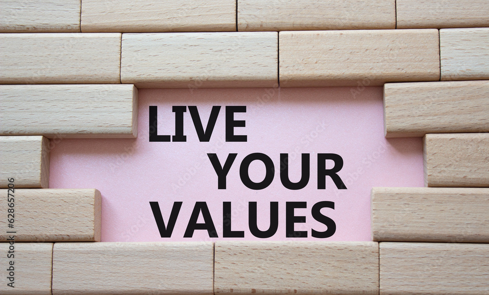 Live your values symbol. Concept words Live your values on wooden ...