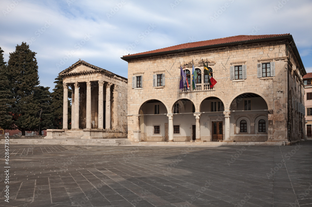 Pula, Istria, Croatia: the ancient Roman Temple of Augustus and the town hall in the downtown of the city