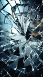 A close-up view of shattered glass, broken with prominent cracks along its edges.