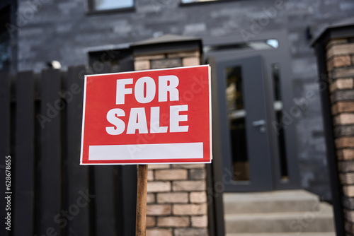 Sign for sale fixed on a stick