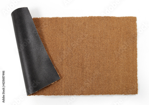Natural brown coconut fiber doormat. Plain natural dry carpet and dirt outside your entrance, Detail, closeup of fiber and base on white background.