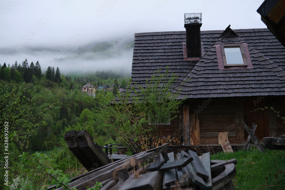 A wooden house in the mountains, with a wonderful view